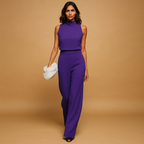Elegant women’s jumpsuit named Sophia with halter neck, wide legs, high waist, decorative bow, and pockets. Perfect for dinners, parties, and evening wear.