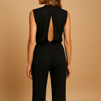 Elegant women’s jumpsuit named Sophia with halter neck, wide legs, high waist, decorative bow, and pockets. Perfect for dinners, parties, and evening wear.