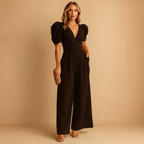Elegant long jumpsuit for women named Clara with tailored fit and flowing silhouette, available in peach, black, yellow, turquoise, and rose red.