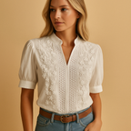 White blouse for women featuring a tailored fit, classic collar, and button closure. Ideal for work, leisure, or evening wear.