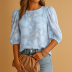 Women’s floral print blouse named Sophia with a flattering fit and elegant style, ideal for both casual wear and formal occasions.