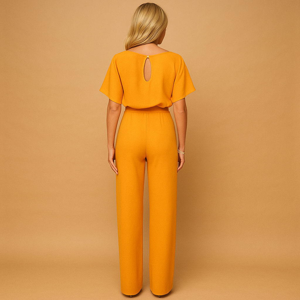 High waist jumpsuit for women named Naomi with lace-up detail, flattering fit, and flowing fabric in black, navy blue, yellow, and apricot.