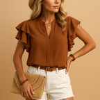 Women’s sleeveless blouse named Amelia with a tailored fit and lightweight fabric. Perfect for work, casual outings, and elegant everyday wear.