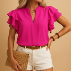 Women’s sleeveless blouse named Amelia with a tailored fit and lightweight fabric. Perfect for work, casual outings, and elegant everyday wear.
